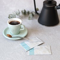 デイリーアロマビューティー コラーゲンのコーヒーと袋デザイン